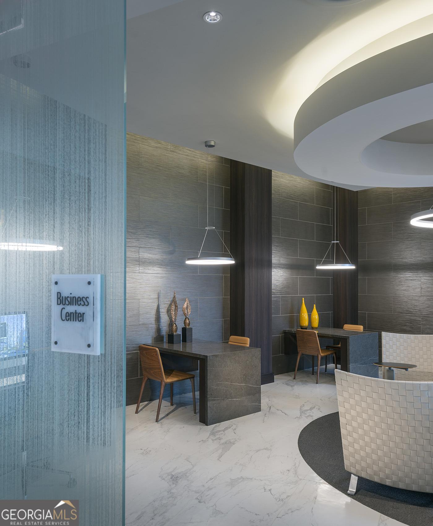 3150 Roswell Road Northwest, Unit 620 Atlanta, GA 30305 - Photo 9 of 26 a living room with furniture and a table