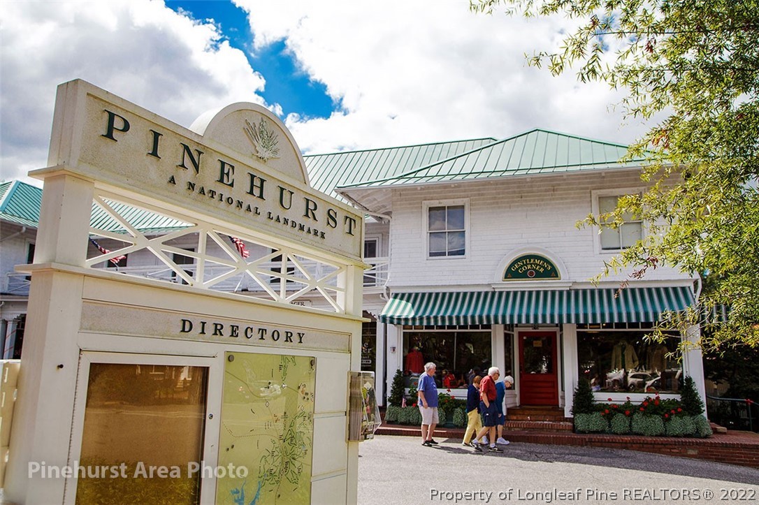 75 Winged Foot Road Pinehurst, NC 28374 - Photo 7 of 12 a view of a cafe with a lot of stuff