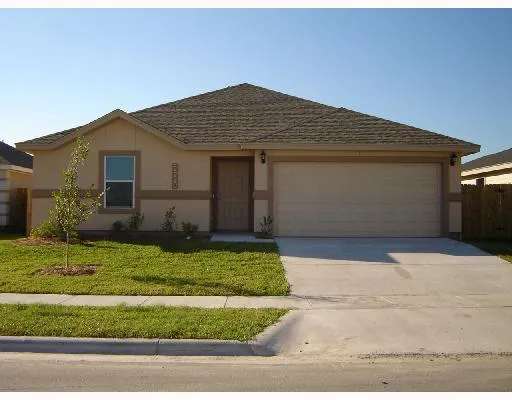a front view of house with garage