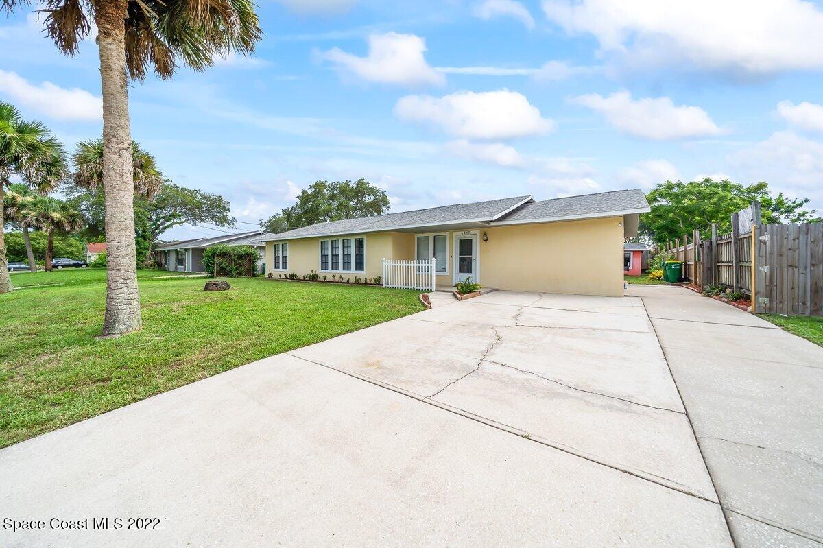 6840 Cairo Road Cocoa, FL 32927 - Photo 2 of 26 a view of house with outdoor space and street view