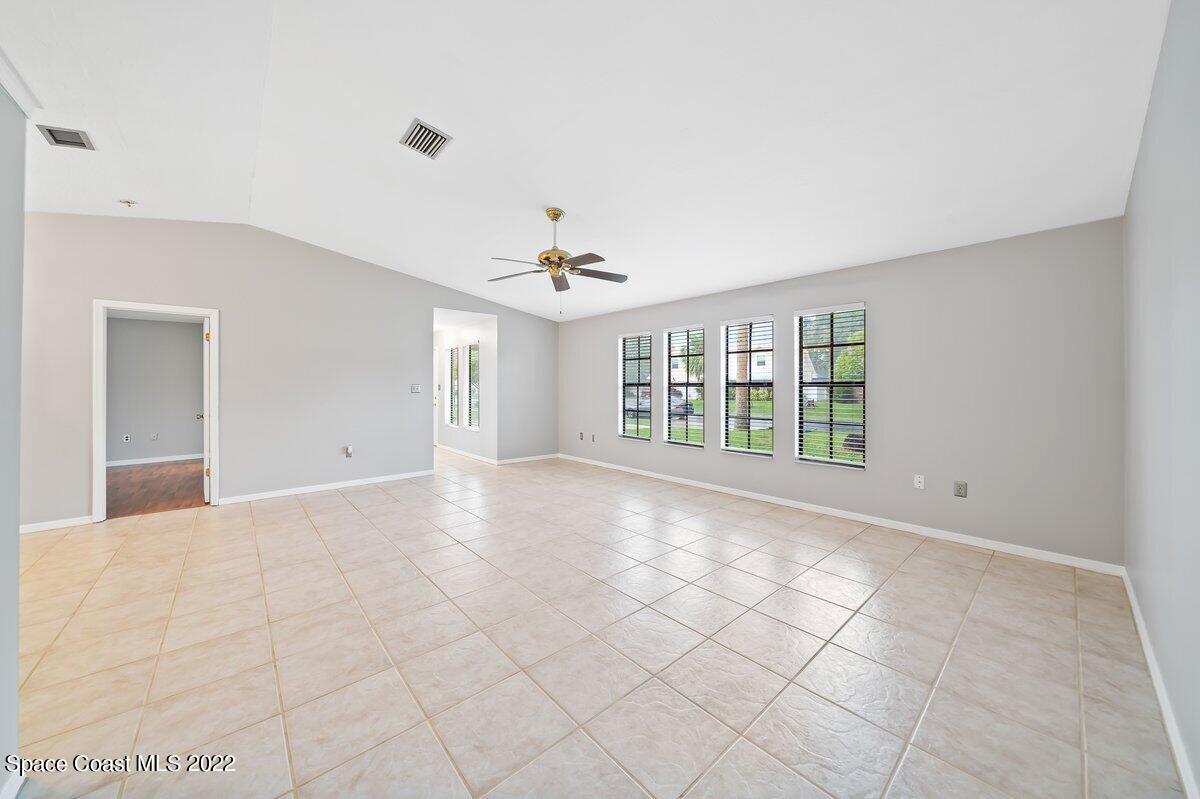 6840 Cairo Road Cocoa, FL 32927 - Photo 9 of 26 a view of an empty room with a window