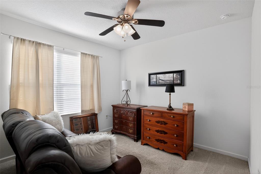 1100 Newton Circle Rockledge, FL 32955 - Photo 21 of 25 a living room with furniture and a window