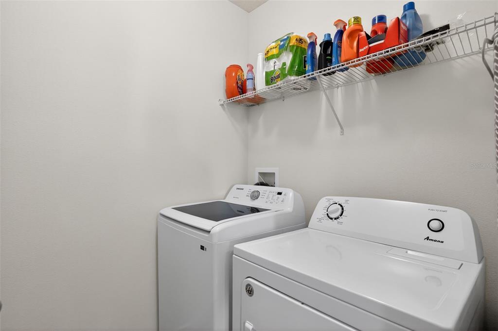 1100 Newton Circle Rockledge, FL 32955 - Photo 22 of 25 a utility room with dryer and washer