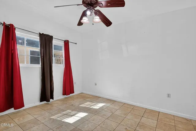 a view of a livingroom with furniture and entryway