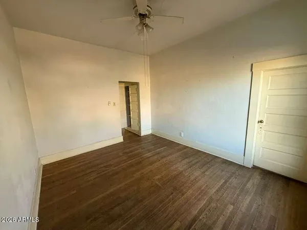 a bathroom with a bathtub and a toilet