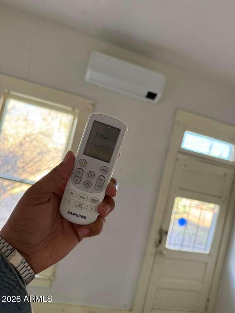 716 11th Street Douglas, AZ 85607 - Photo 26 of 26 a living room with furniture and a window