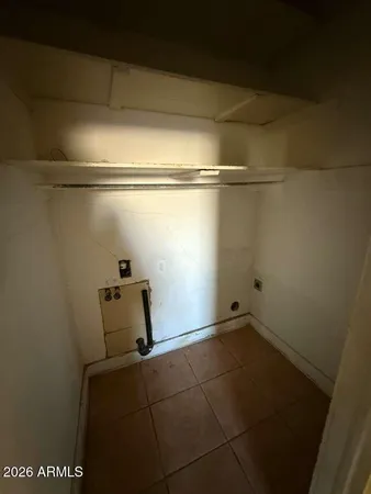 a view of a room with racks on the wall