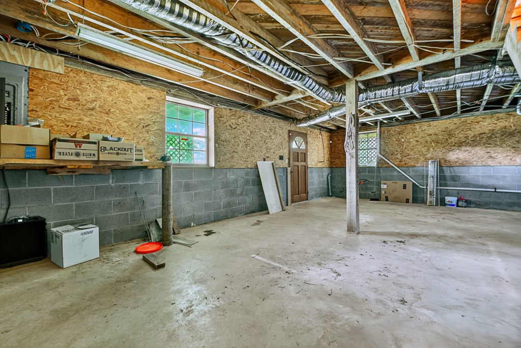 28.65 Jolley Way Epworth, GA 30541 - Photo 24 of 55 a view of a room with wooden shelves