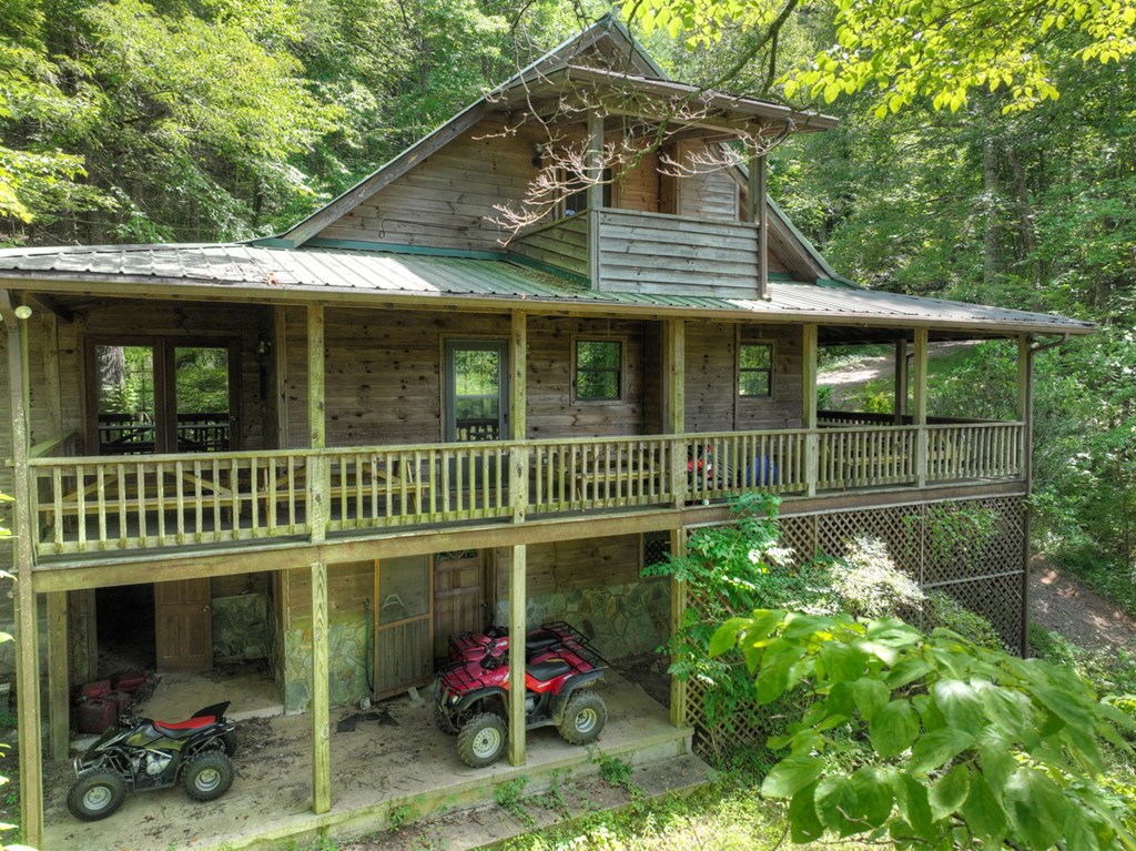 28.65 Jolley Way Epworth, GA 30541 - Photo 29 of 55 a view of a brick house with a small yard and a garden