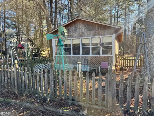 a house with trees in front of it