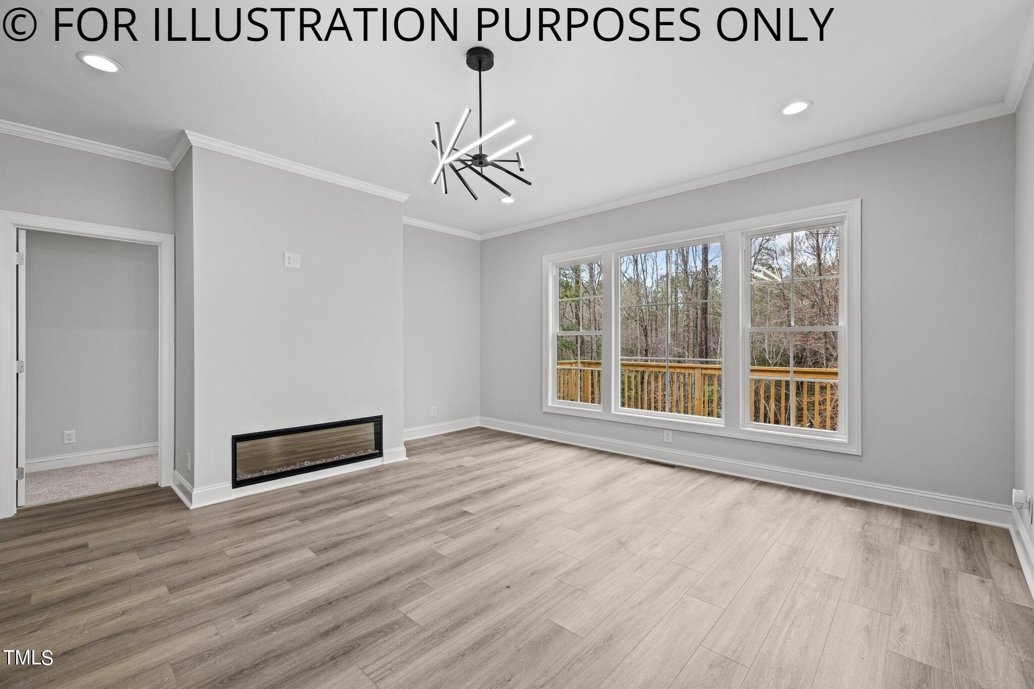 622 Sherron Road Durham, NC 27703 - Photo 9 of 22 a view of an empty room with wooden floor and a window