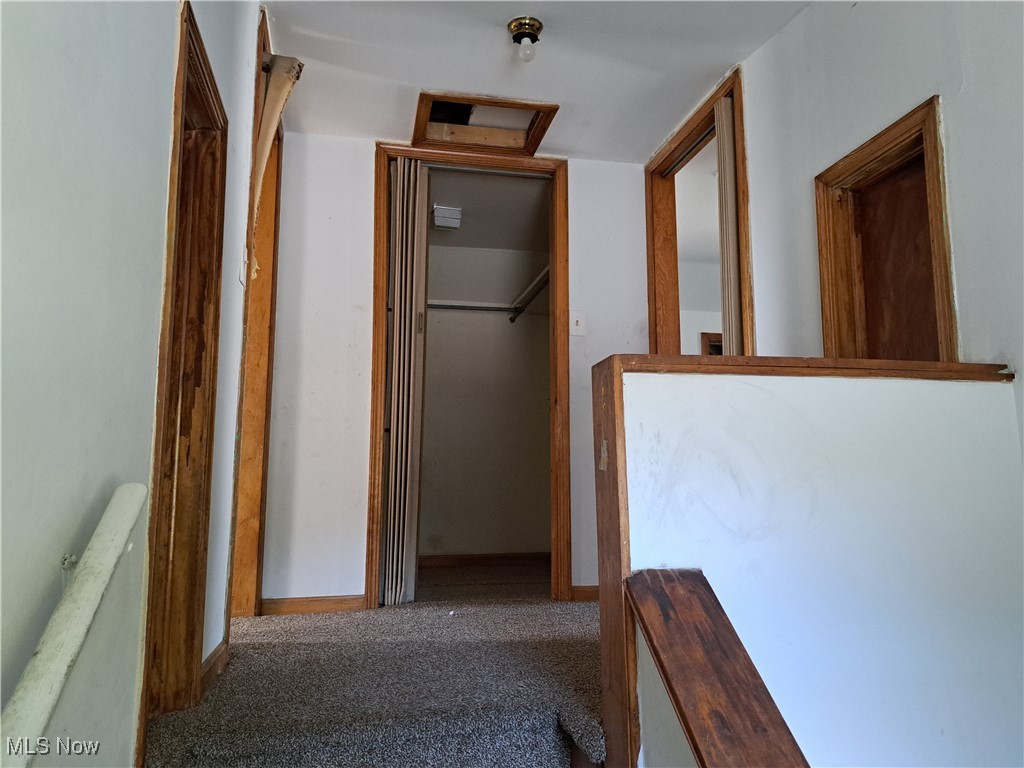 2245 North Ridge Road Lorain, OH 44055 - Photo 14 of 24 Corridor with carpet flooring