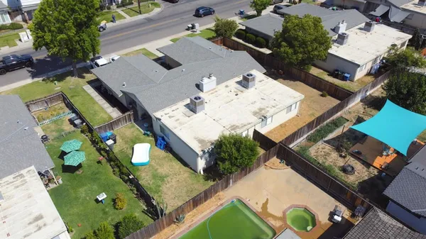 an aerial view of a backyard