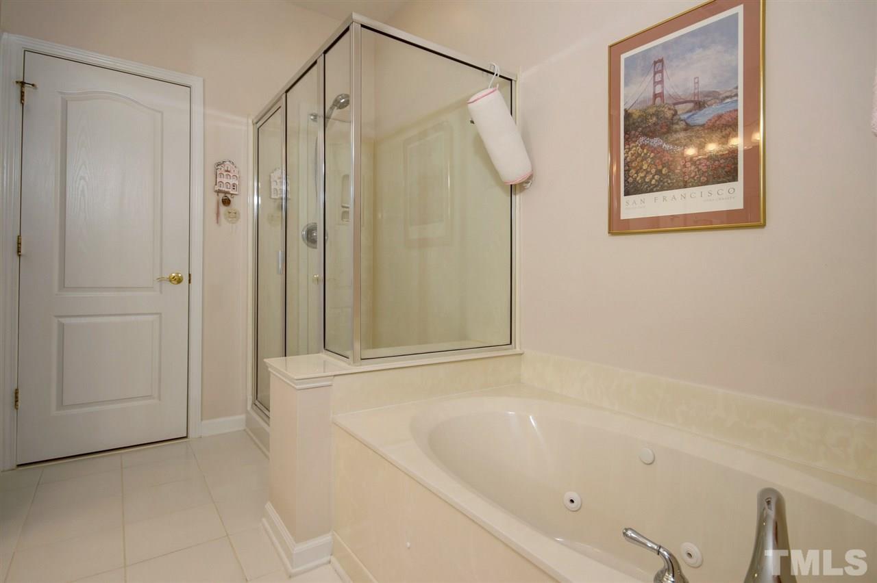 5427 Brandy Bay Road Raleigh, NC 27613 - Photo 17 of 25 Soak in your garden tub after a long day at work or a hard day of play. Read a good book and enjoy a glass of wine.
