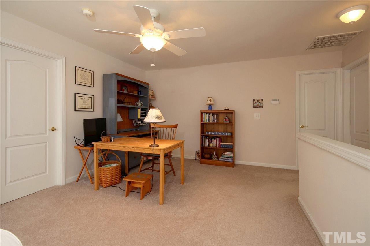 5427 Brandy Bay Road Raleigh, NC 27613 - Photo 18 of 25 Open loft area is PERFECT for an office space, crafts area or bonus room. Ceiling fan and carpeted and overlooks the family room. There is also a floored storage space room on the 2nd floor.