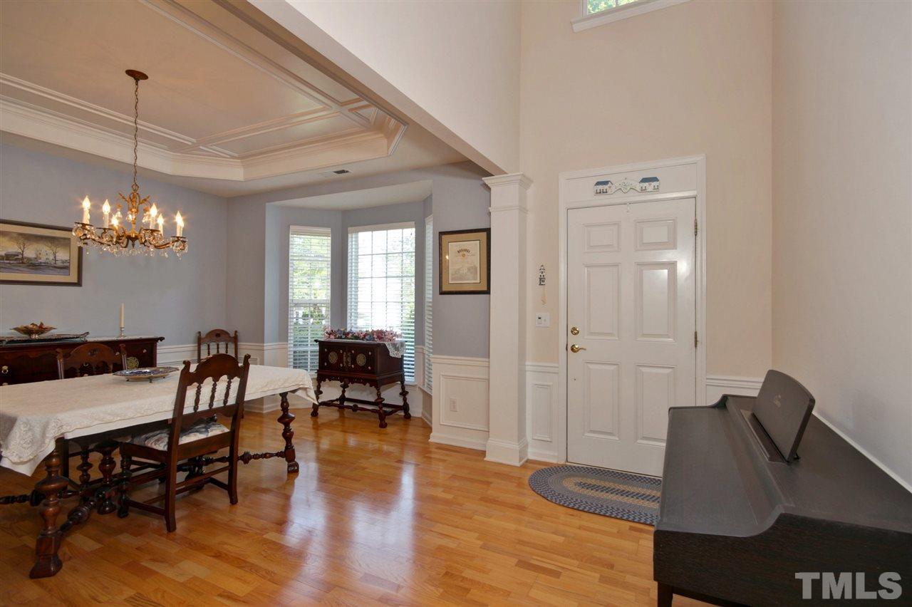 5427 Brandy Bay Road Raleigh, NC 27613 - Photo 3 of 25 Large open foyer features high ceilings and allow for plenty of natural light. Original hardwoods through the foyer, kitchen and dining room are beautiful.
