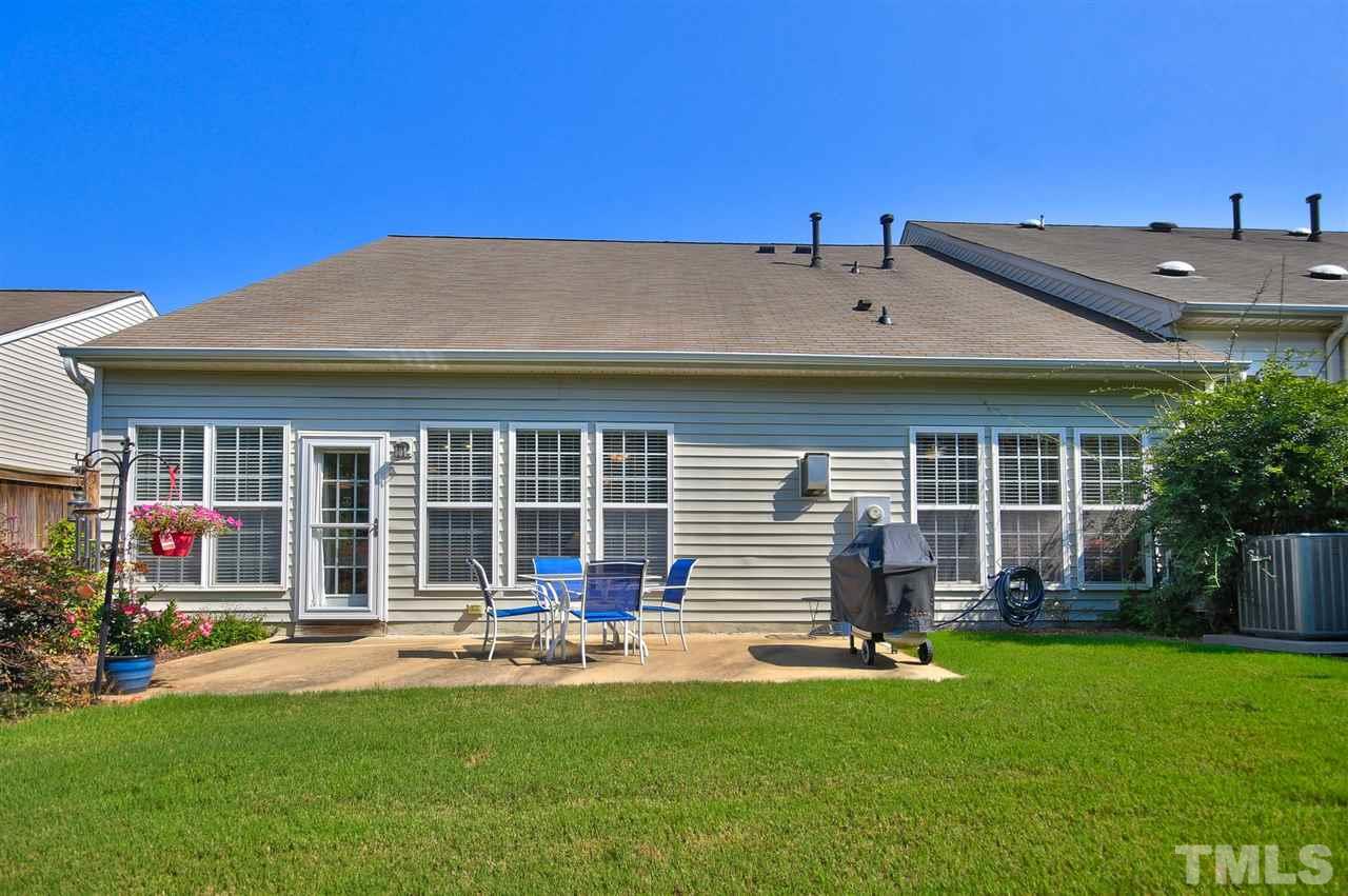 5427 Brandy Bay Road Raleigh, NC 27613 - Photo 21 of 25 VERY private! Privacy fence on both sides and no neighbors behind. Completely landscaped with an irrigation system in front maintained by the HOA. Storm door so you can let in our wonderful NC fresh air during the fall!