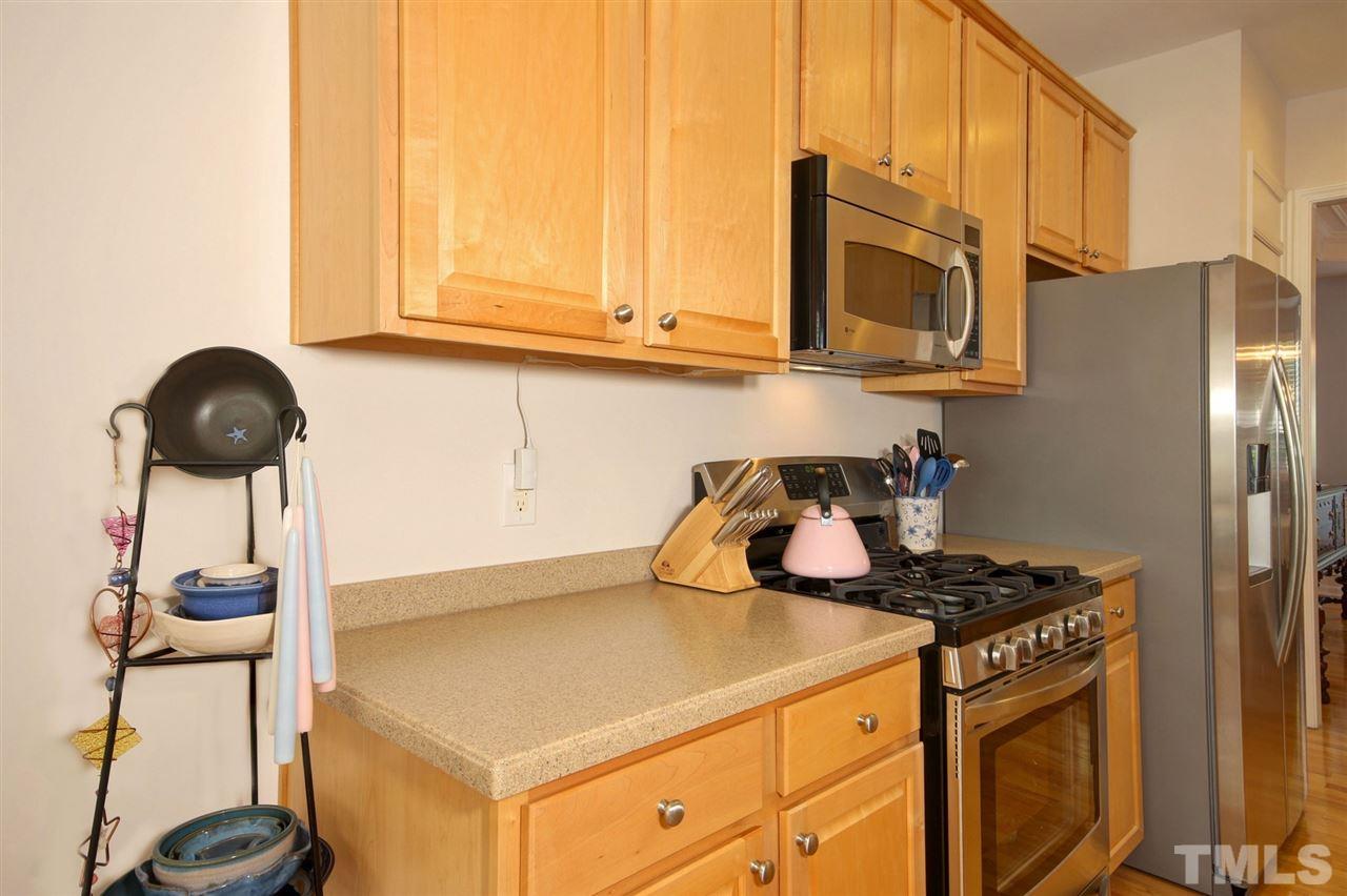 5427 Brandy Bay Road Raleigh, NC 27613 - Photo 10 of 25 Built in desk area in the kitchen. Great for homework space or storing your paperwork.