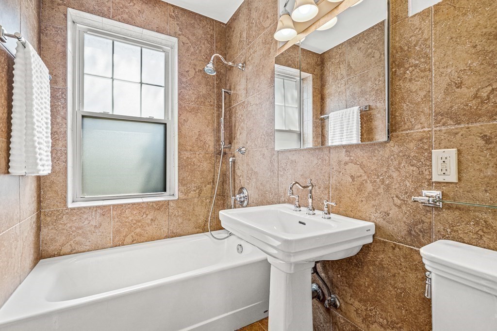 6 Lanark Road, Unit 4 Brookline, MA 02445 - Photo 21 of 23 a bathroom with a sink and a bathtub