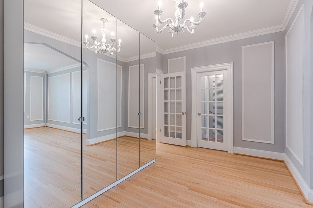 6 Lanark Road, Unit 4 Brookline, MA 02445 - Photo 9 of 23 a view of a livingroom with a chandelier