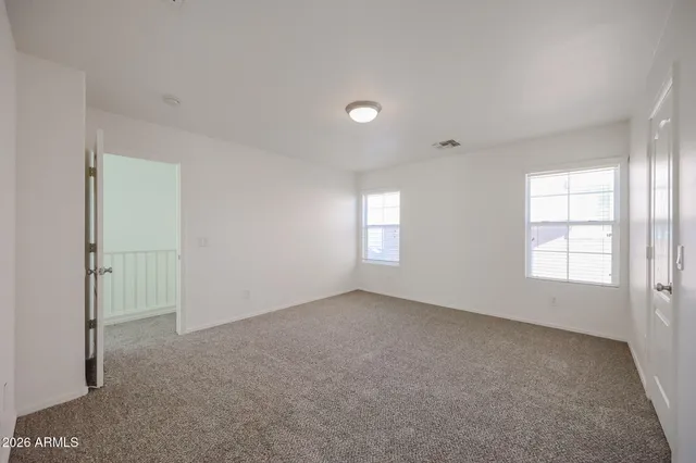 an empty room with windows