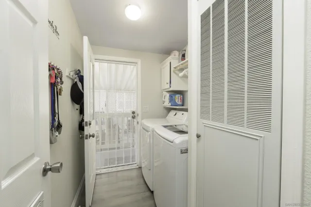 a bathroom with a sink a mirror and shower