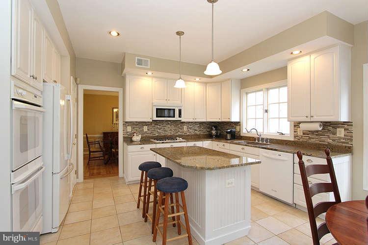 4619 Brightwood Road Olney, MD 20832 - Photo 11 of 30 Kitchen with granite counter tops