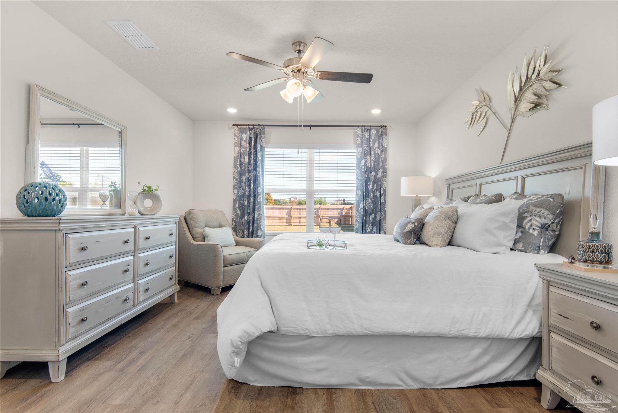 5213 Conservation Circle Pace, FL 32571 - Photo 9 of 13 a room with bed and window