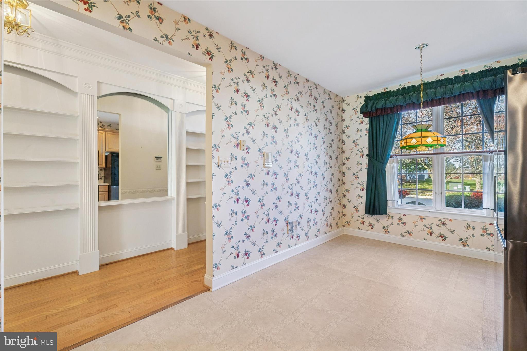 416 Ruth Court Harleysville, PA 19438 - Photo 13 of 35 a view of an empty room with window and cabinet