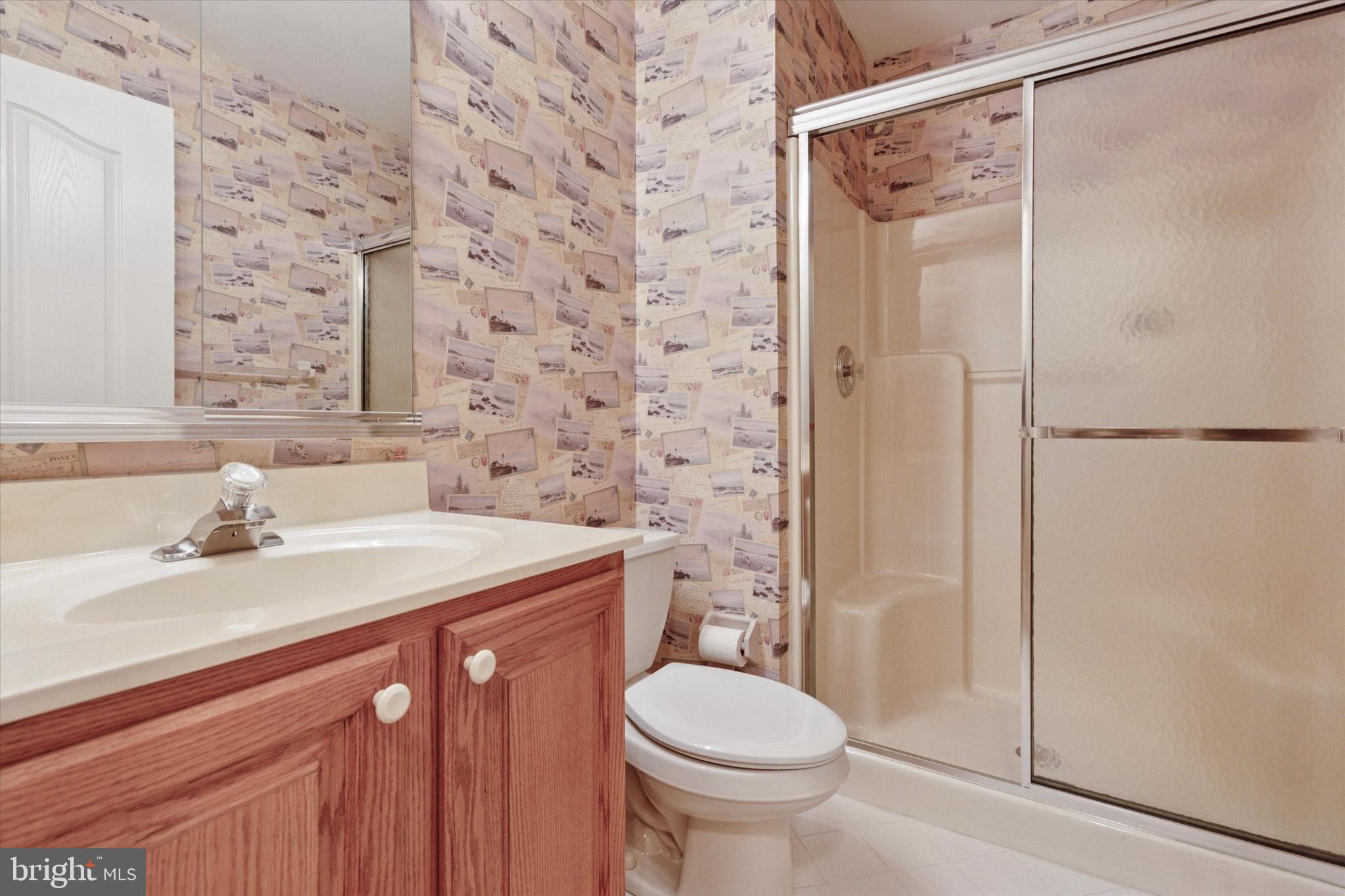 416 Ruth Court Harleysville, PA 19438 - Photo 27 of 35 a bathroom with a sink a toilet and shower