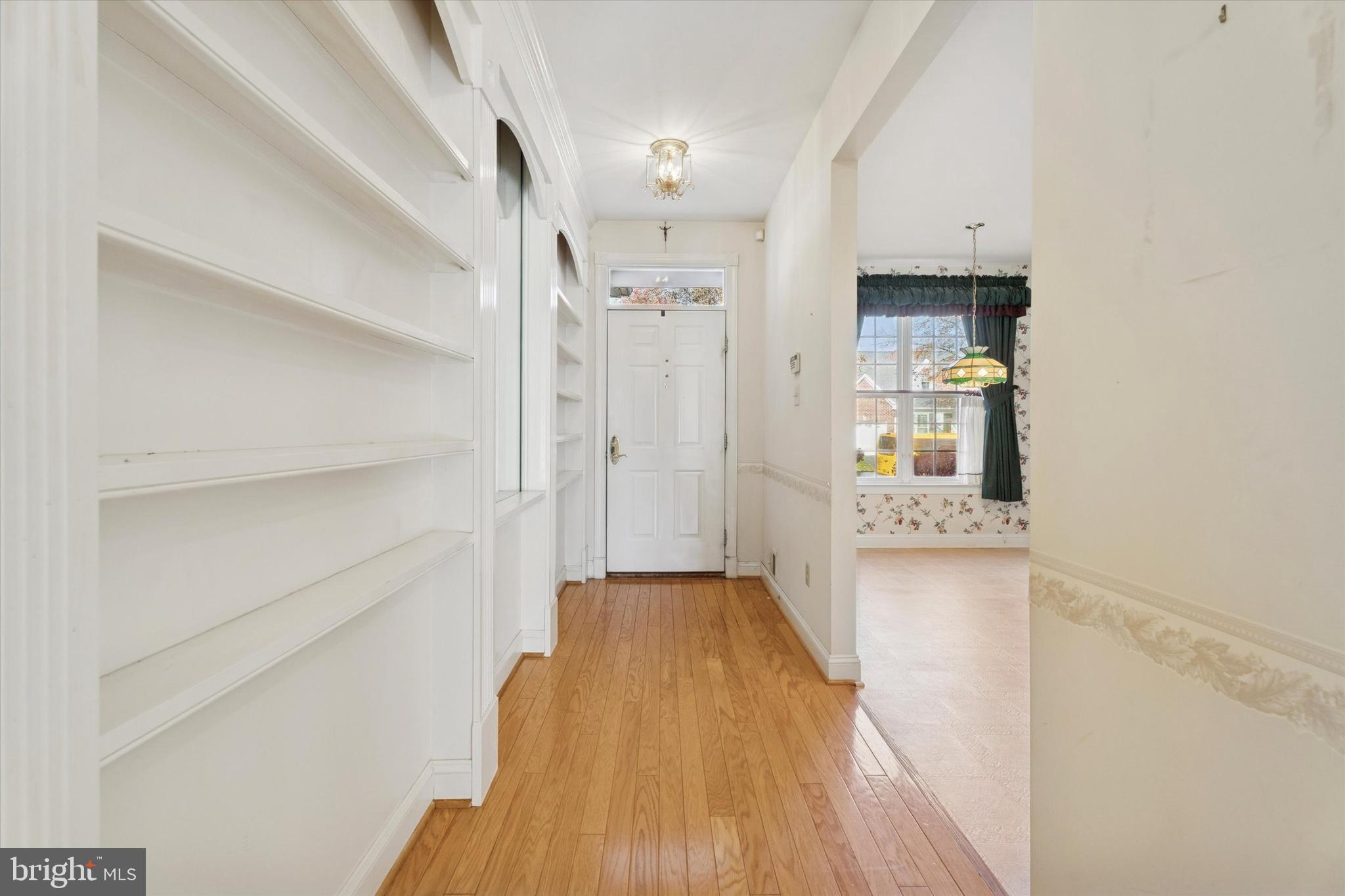 416 Ruth Court Harleysville, PA 19438 - Photo 4 of 35 a view of a hallway with wooden floor and staircase