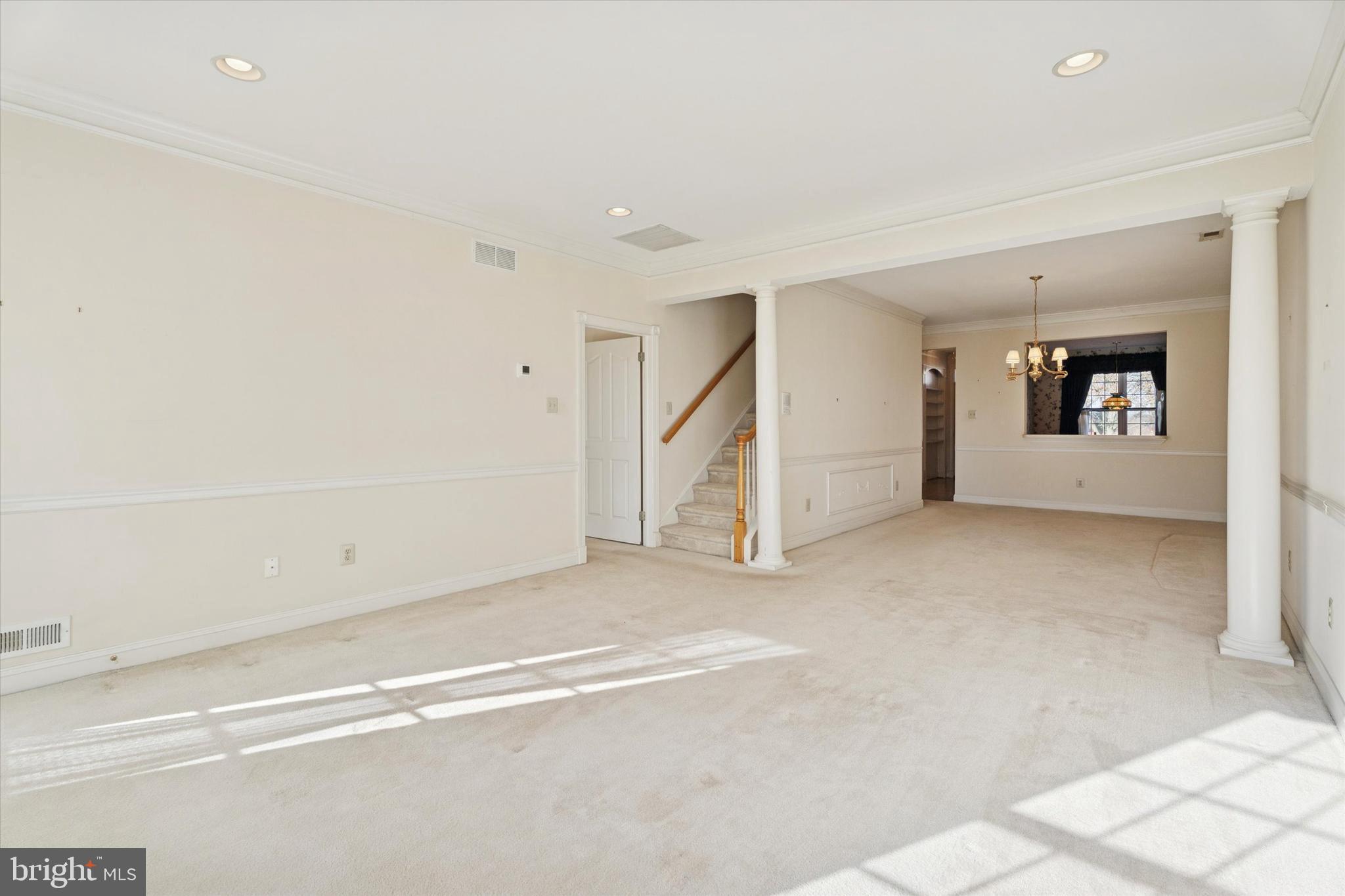 416 Ruth Court Harleysville, PA 19438 - Photo 6 of 35 an empty room with a empty space and windows