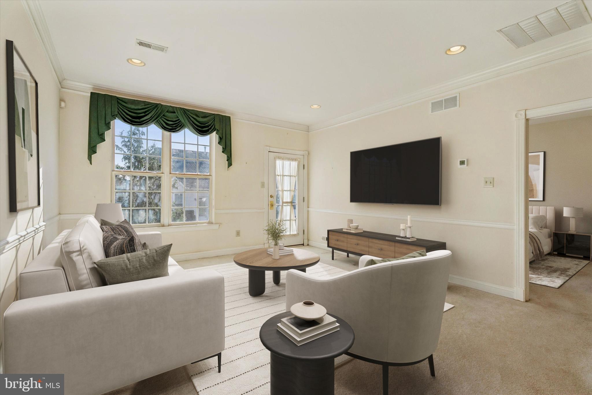 416 Ruth Court Harleysville, PA 19438 - Photo 7 of 35 a living room with furniture and a flat screen tv