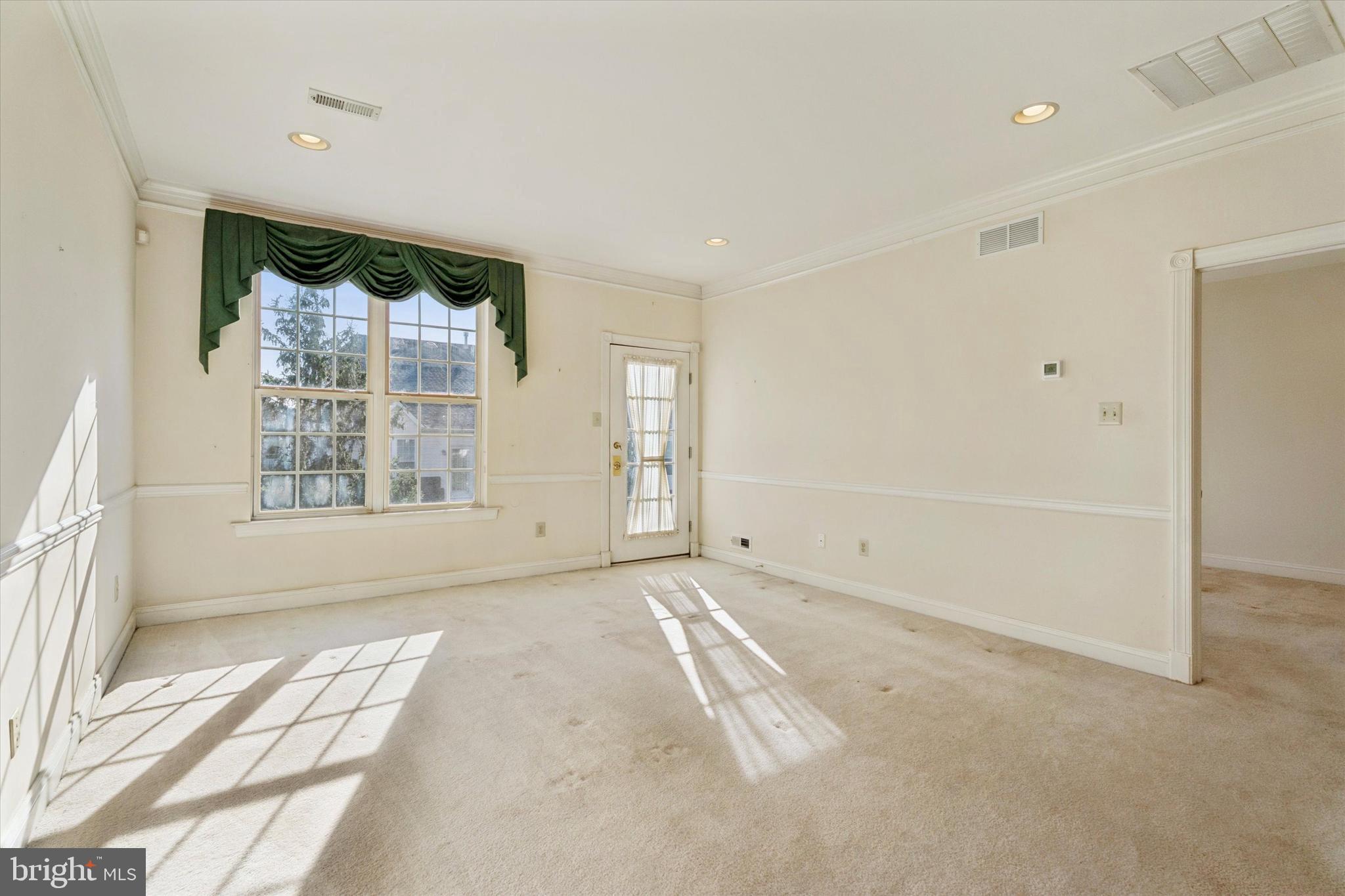416 Ruth Court Harleysville, PA 19438 - Photo 8 of 35 a view of an empty room with a window