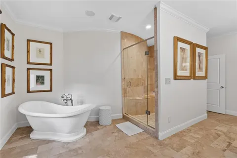 a bathroom with a double vanity sink mirror and shower