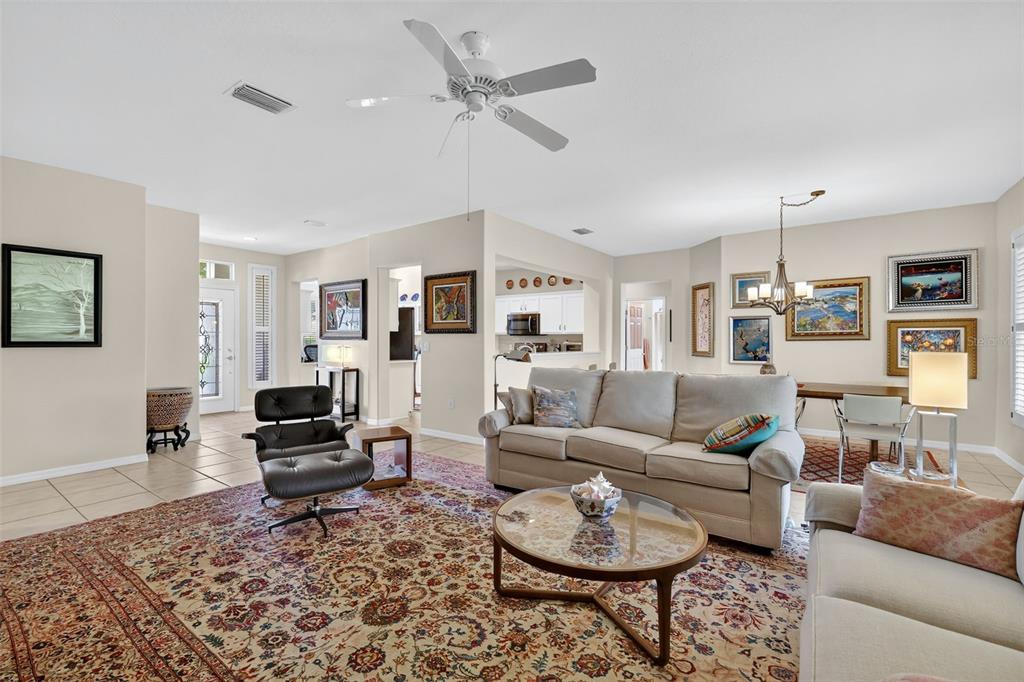 13536 Southeast 97th Terrace Road Summerfield, FL 34491 - Photo 12 of 34 a living room with furniture or couches and a coffee table