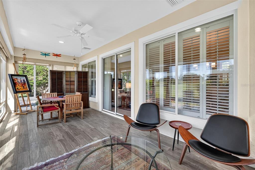 13536 Southeast 97th Terrace Road Summerfield, FL 34491 - Photo 24 of 34 a living room with furniture and large windows
