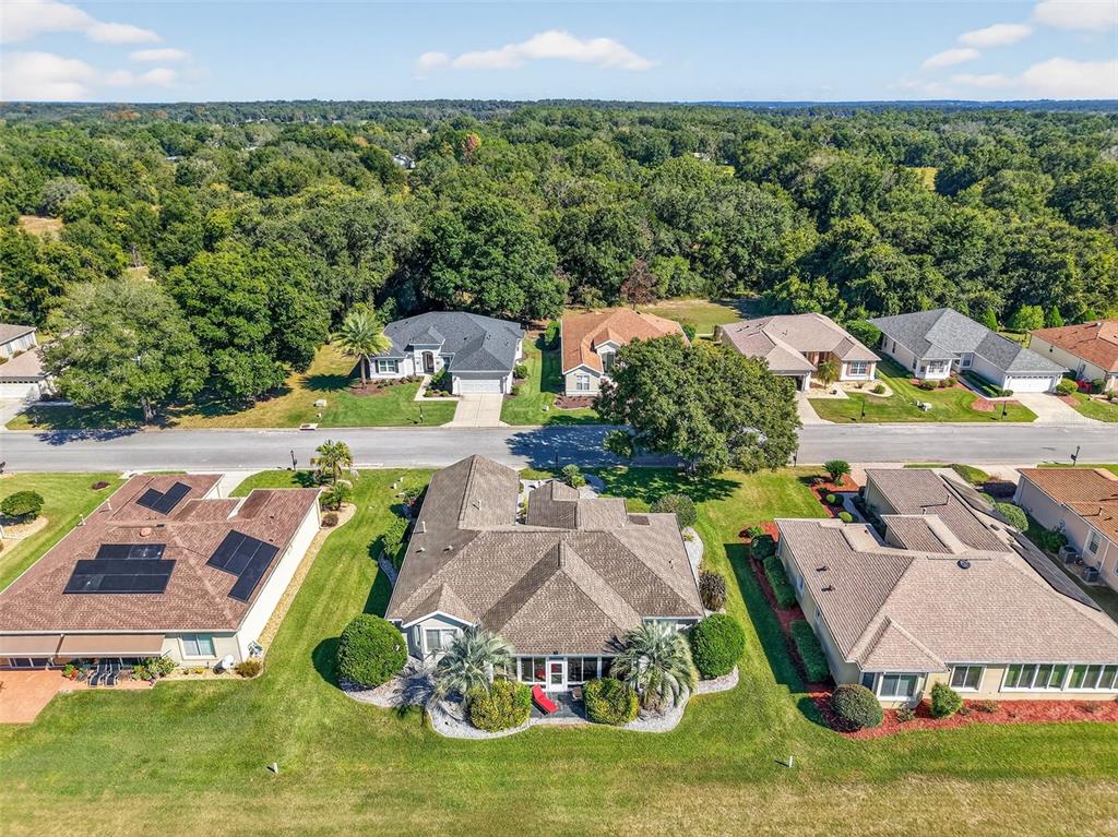 13536 Southeast 97th Terrace Road Summerfield, FL 34491 - Photo 31 of 34 an aerial view of a house with outdoor space