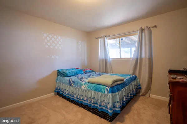 a view of a livingroom with storage & utility room