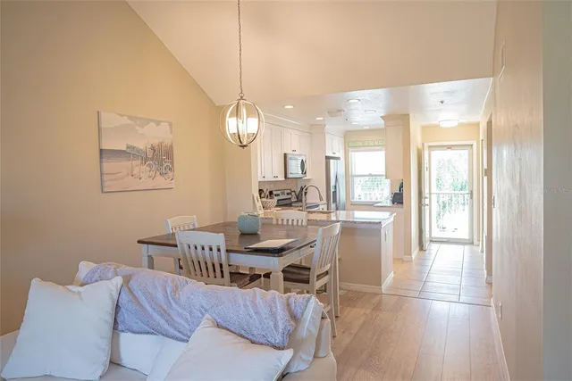 a bedroom with a bed and cabinets