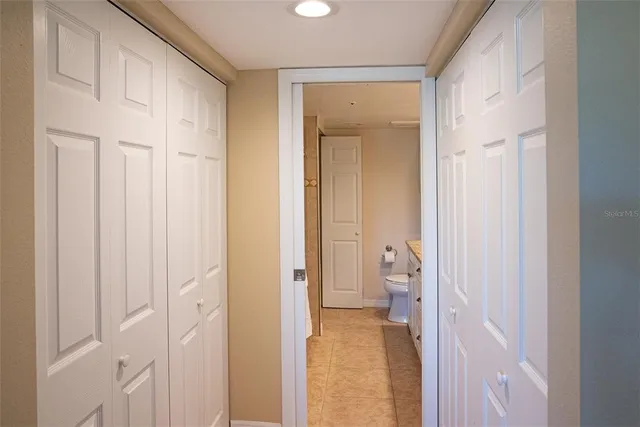 an aerial view of a house with outdoor space