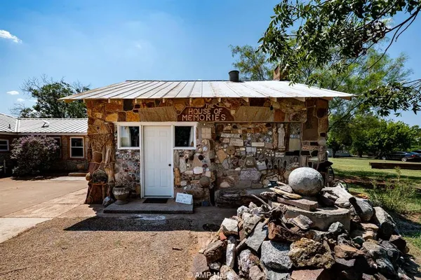 a view of a chairs and tables in the patio