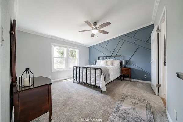 a bathroom with a granite countertop sink toilet and a mirror