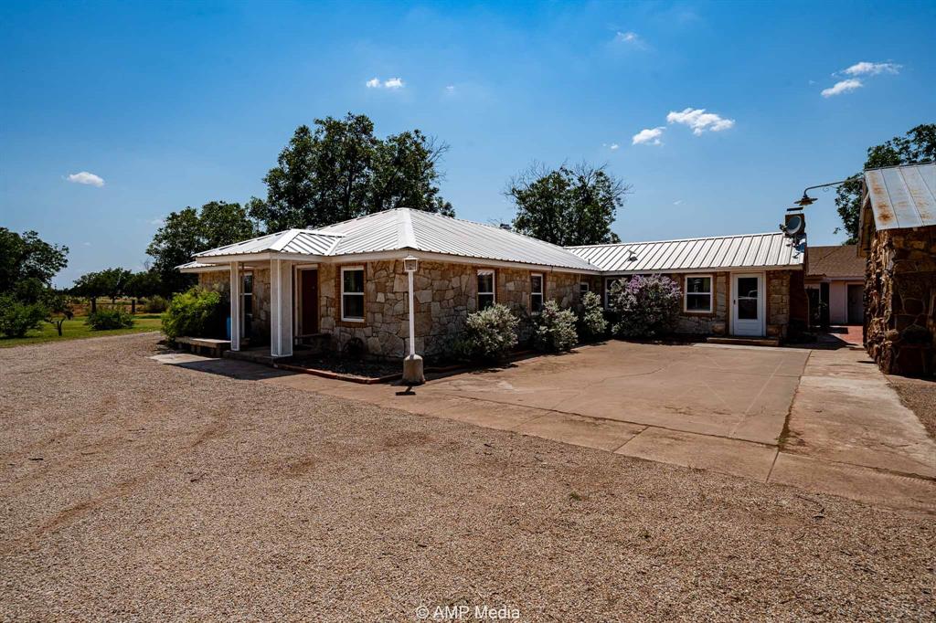 130 County Road 104 Roby, TX 79543 - Photo 5 of 39 a view of a street with a house