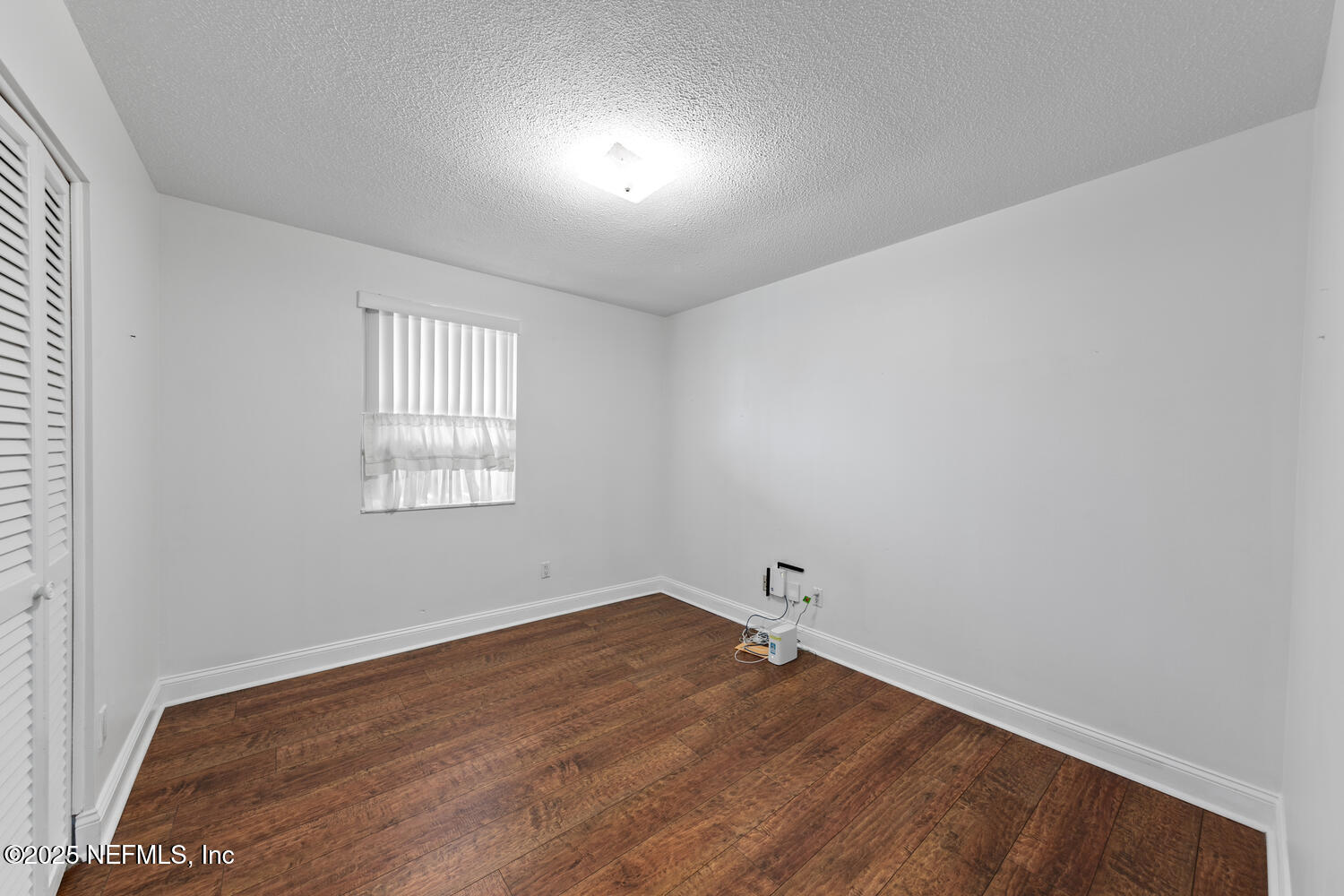 1144 Crown Drive Jacksonville, FL 32221 - Photo 13 of 20 an empty room with a window