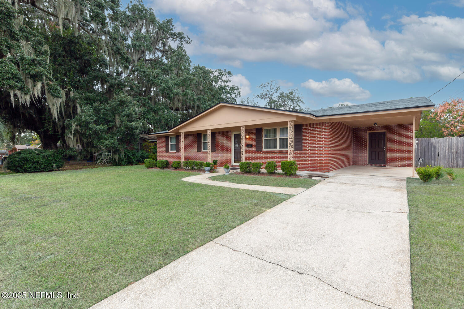 1144 Crown Drive Jacksonville, FL 32221 - Photo 2 of 20 a front view of a house with a yard