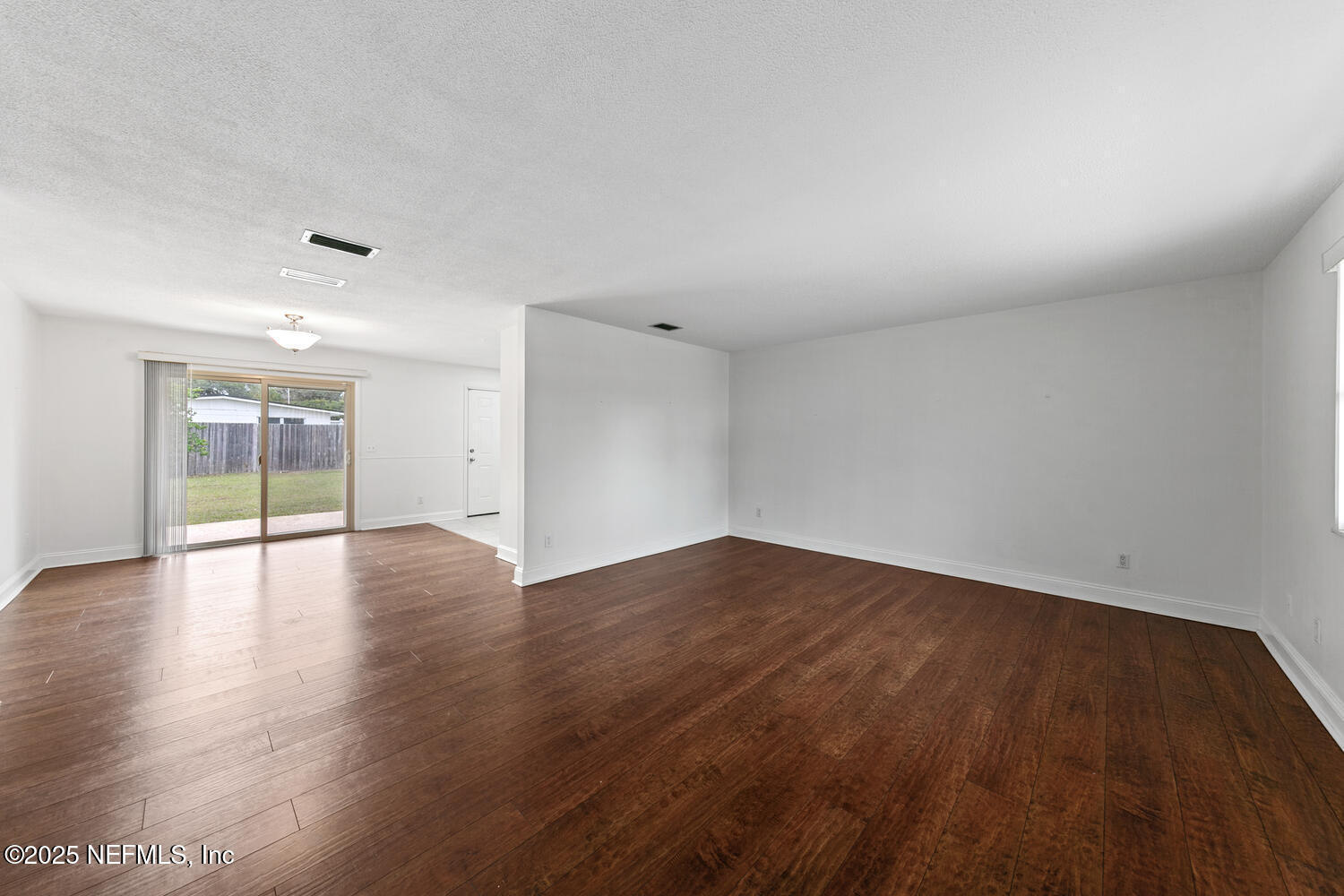 1144 Crown Drive Jacksonville, FL 32221 - Photo 3 of 20 a view of empty room with wooden floor