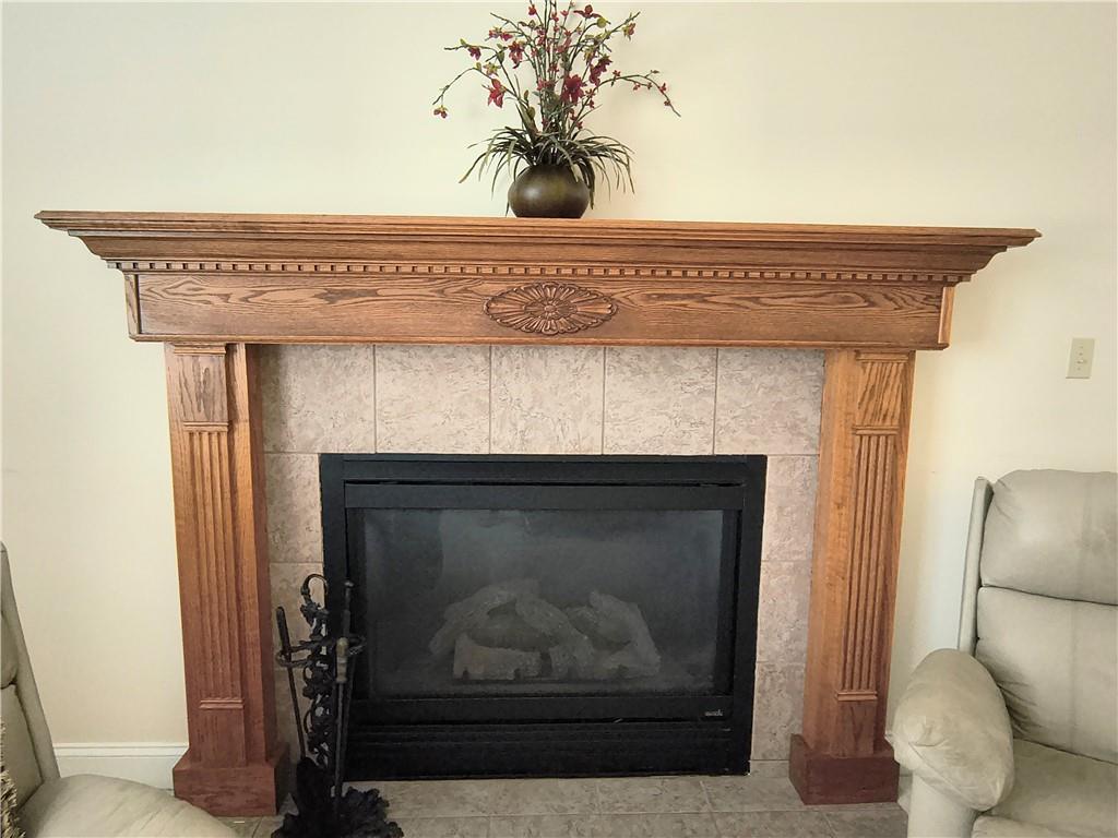 3701 Tudor Drive Butler, PA 16001 - Photo 12 of 30 Custom-built oak mantle & ceramic surround