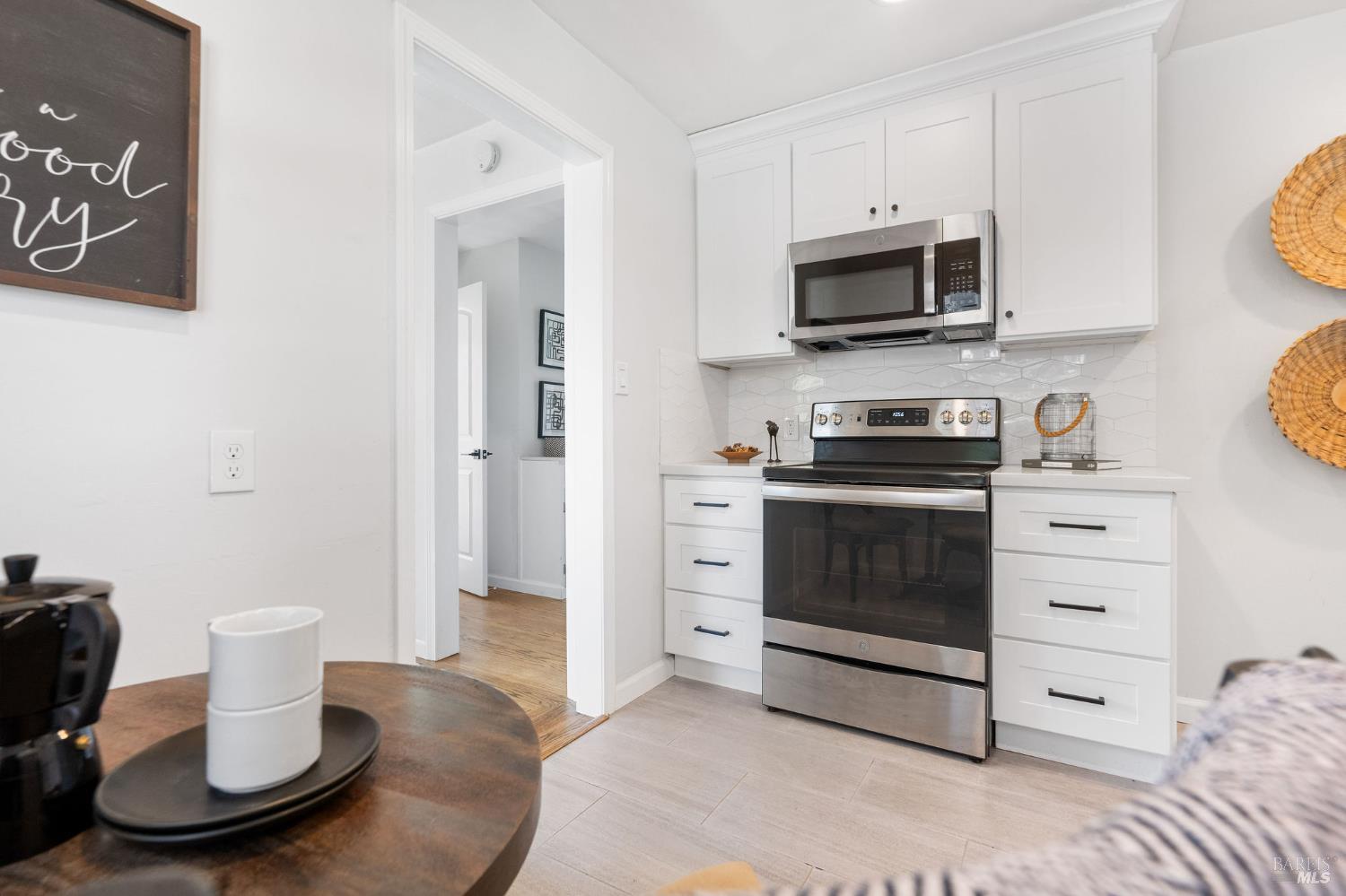 2005 Adrian Street Napa, CA 94559 - Photo 14 of 32 a kitchen with a stove and a microwave