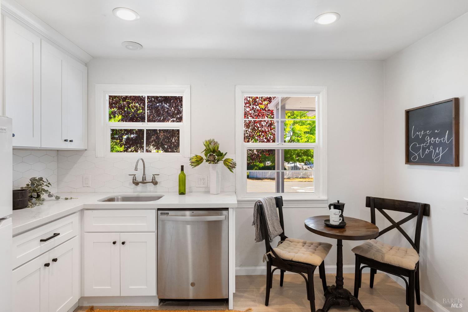 2005 Adrian Street Napa, CA 94559 - Photo 16 of 32 a kitchen with a sink cabinets and window